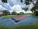 This game area features an assortment of games and a variety of seating areas surrounded by lush landscaping at 8222 Haven Harbour Way, Bradenton, FL 34212