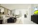 Spacious living room with contemporary furnishings and an open floor plan at 8544 Bella Mar Trl, Parrish, FL 34219