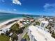 Aerial view showing waterfront condos near the beach and intercoastal waters and other amenities at 855 Bayway Blvd # 908, Clearwater Beach, FL 33767