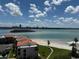 Beautiful aerial view of the neighborhood, water, beach, and local cityscape at 855 Bayway Blvd # 908, Clearwater Beach, FL 33767