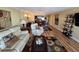 Spacious living area with hardwood flooring, showcasing a comfortable seating arrangement and an open floor plan at 855 Bayway Blvd # 908, Clearwater Beach, FL 33767