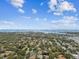 Scenic aerial view showcasing neighborhood proximity to the water and bay at 878 Franklin Cir, Palm Harbor, FL 34683