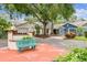 Attractive community featuring well-maintained homes, mature trees, and beautiful landscaping, enhancing the neighborhood's charm at 878 Franklin Cir, Palm Harbor, FL 34683