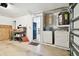 Functional laundry area features essential appliances, storage cabinets, and an efficient layout at 878 Franklin Cir, Palm Harbor, FL 34683