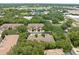 An aerial view of residences that features mature landscaping, and dedicated parking at 897 Lantern Way, Clearwater, FL 33765