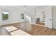 A spacious bedroom with wood floors and plenty of natural light, creating a warm and inviting atmosphere at 905 N Willow Ave, Tampa, FL 33606