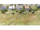 Aerial view of houses with screened in pools and manicured lawns at 916 Bunker View Dr, Apollo Beach, FL 33572