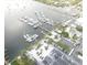 Aerial view of the marina with boats docked and a parking lot available at 916 Bunker View Dr, Apollo Beach, FL 33572
