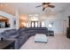 Expansive living room boasts high ceilings, open layout, and stylish seating arrangement at 916 Bunker View Dr, Apollo Beach, FL 33572