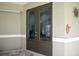 Detailed glass etched patio doors leading to an outdoor living space at 916 Bunker View Dr, Apollo Beach, FL 33572
