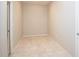 Light filled room featuring tile floor and multiple electrical outlets that can be used as storage or an office at 916 Bunker View Dr, Apollo Beach, FL 33572