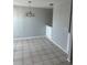 Clean dining room with modern floors, overhead chandelier and neutral wall color at 1 Windrush Blvd # 84, Indian Rocks Beach, FL 33785