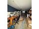 The basement features an office area, storage shelves and a window at 114 N Arcturas Ave, Clearwater, FL 33765