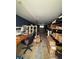 The basement features an office area, storage shelves and a window at 114 N Arcturas Ave, Clearwater, FL 33765