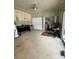 Bedroom featuring ample closet space and adjacent workspace with natural light at 114 N Arcturas Ave, Clearwater, FL 33765