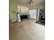 Bedroom featuring ample closet space and adjacent workspace with natural light at 114 N Arcturas Ave, Clearwater, FL 33765