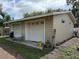 Detached two-car garage providing ample parking and storage space at 114 N Arcturas Ave, Clearwater, FL 33765