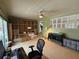 Home office featuring carpeted floors, ample storage, and abundant natural light at 114 N Arcturas Ave, Clearwater, FL 33765