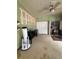 Bright office features a ceiling fan, double closet, and connected storage space at 114 N Arcturas Ave, Clearwater, FL 33765