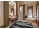 Inviting bathroom featuring vanity, bathtub, walk-in shower, and large mirrors for a spa-like experience at 12713 Grand Traverse Dr, Dade City, FL 33525