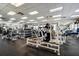 Well-equipped gym with various exercise machines and ample space for workouts at 12713 Grand Traverse Dr, Dade City, FL 33525