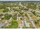 This aerial shot showcases the quiet streets, well-kept lawns, and beautiful homes in the neighborhood at 13991 Coronado Dr, Spring Hill, FL 34609