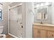 Bathroom with shower, toilet, and vanity with light above mirror at 13991 Coronado Dr, Spring Hill, FL 34609