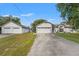 Charming single-story home with attached and detached two-car garages at 13991 Coronado Dr, Spring Hill, FL 34609