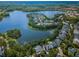 Panoramic aerial view of community nestled on a lake, showcasing stunning scenery at 14617 Galt Lake Dr, Tampa, FL 33626