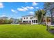 A spacious yard with a playground, waterslide and trampoline provides ample room for outdoor activities and enjoyment at 14617 Galt Lake Dr, Tampa, FL 33626