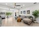 Spacious bonus room with modern exercise equipment, neutral decor, and large windows providing ample natural light at 14617 Galt Lake Dr, Tampa, FL 33626