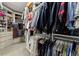 Spacious walk-in closet with ample hanging and shelving space for clothes and accessories at 14617 Galt Lake Dr, Tampa, FL 33626