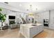 Island kitchen overlooking the living room featuring a fireplace at 14617 Galt Lake Dr, Tampa, FL 33626