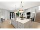 The island kitchen opens up to the living room, great for entertaining at 14617 Galt Lake Dr, Tampa, FL 33626