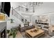 Open-concept living room showcases a fireplace, staircase, and kitchen at 14617 Galt Lake Dr, Tampa, FL 33626