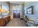 Comfortable lobby area with elegant decor, wood-look flooring, and stylish furnishings at 14617 Galt Lake Dr, Tampa, FL 33626