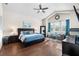 Tranquil main bedroom with hardwood floors, ample natural light, and a ceiling fan at 15415 Otto Rd, Tampa, FL 33624