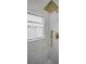 Beautiful bathroom featuring gold fixtures, marble tile, and modern design at 1557 77Th N Ave, St Petersburg, FL 33702
