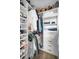 Organized walk-in closet with custom shelving and ample storage space for clothes and shoes at 1557 77Th N Ave, St Petersburg, FL 33702