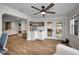 Comfortable living area that includes a coffee bar and view of the lanai and pool at 1557 77Th N Ave, St Petersburg, FL 33702