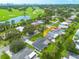 Aerial view of the property highlighting its location near a golf course and water at 1723 Cypress Ave, Belleair, FL 33756