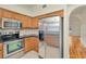 Modern kitchen boasts stainless steel appliances and plenty of cabinet space at 1734 Mapleleaf Blvd, Oldsmar, FL 34677