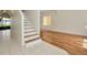 Elegant living room features hardwood floors, white walls and a staircase at 1734 Mapleleaf Blvd, Oldsmar, FL 34677