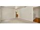 Spacious main bedroom features neutral carpet and en suite bathroom access at 1734 Mapleleaf Blvd, Oldsmar, FL 34677