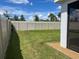 Lush backyard with a privacy fence, offering a serene outdoor space for relaxation and entertainment at 17807 Canopy Pl, Bradenton, FL 34211