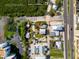 Overhead view shows the property's location near waterfront, parking, and a main road at 19109 2Nd St, Indian Shores, FL 33785