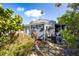 Backyard featuring a wooden deck and storage shed at 19109 2Nd St, Indian Shores, FL 33785