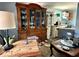Kitchen with wood cabinets and dining area at 19109 2Nd St, Indian Shores, FL 33785