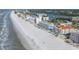Stunning aerial view of a condominium on a beach at 19440 Gulf Blvd # 301, Indian Rocks Beach, FL 33785