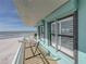This balcony offers a hammock with ocean views, with storm shutters for added protection at 19440 Gulf Blvd # 301, Indian Rocks Beach, FL 33785